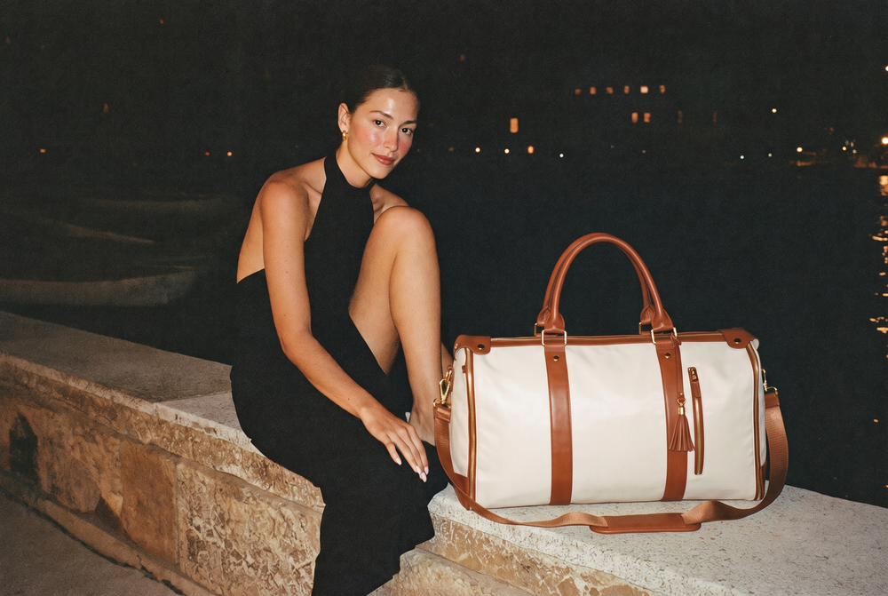 Andelène editorial: Hydra, Greece — The last boat can wait. AI-generated campaign photograph.