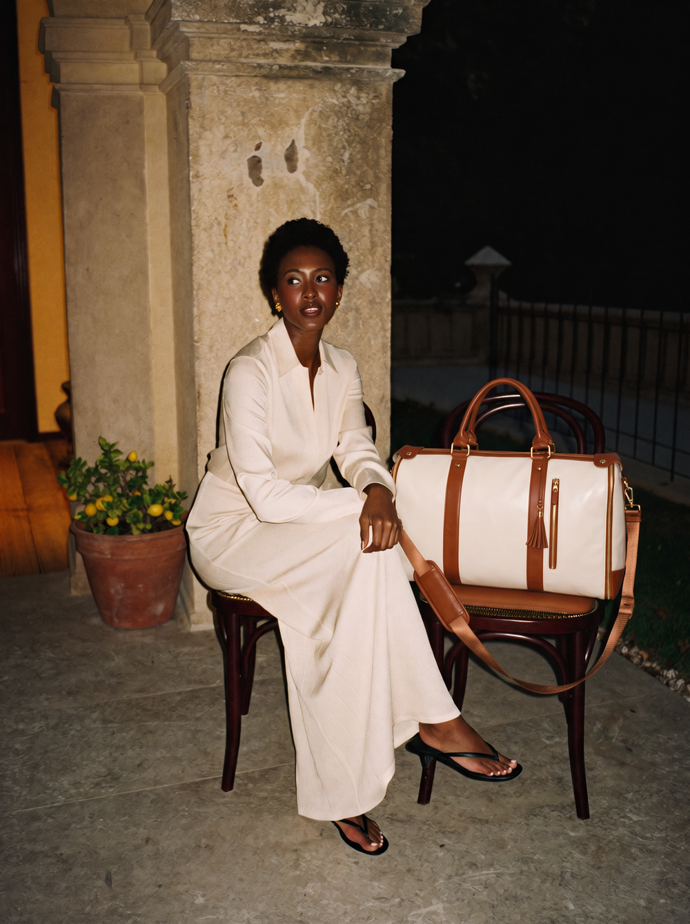 Andelène editorial: Taormina, Sicily — Dinner ran into tomorrow. AI-generated campaign photograph.