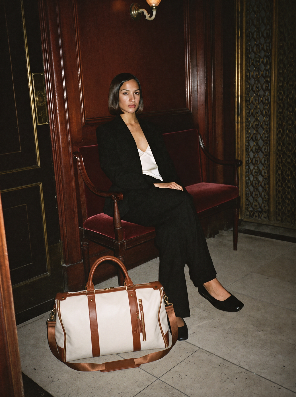 Andelène editorial: Venice, after hours — Room 204. Eventually. AI-generated campaign photograph.
