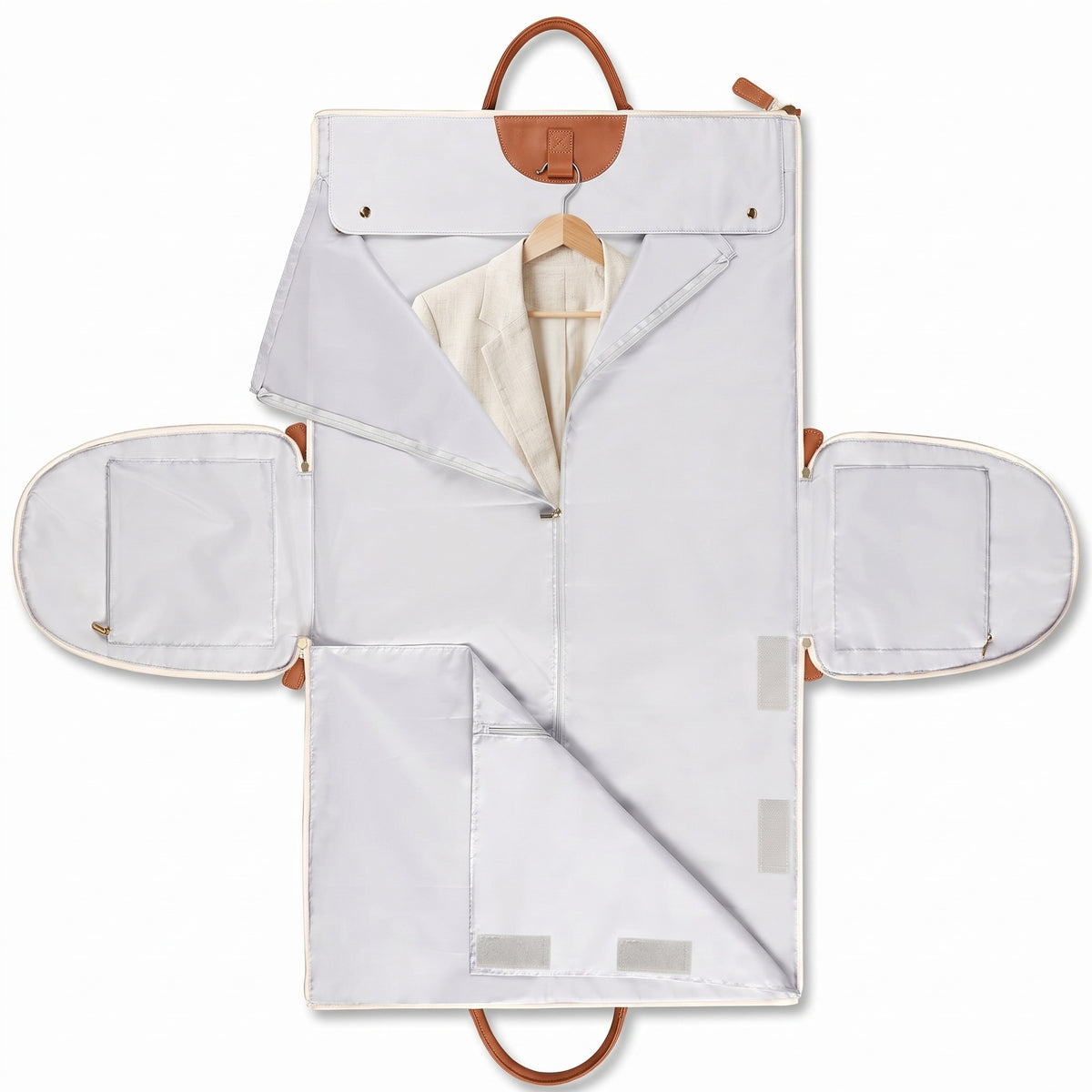 The OneBag unfolded garment layout, shown in Ivory & Cognac. Clothing is for styling.
